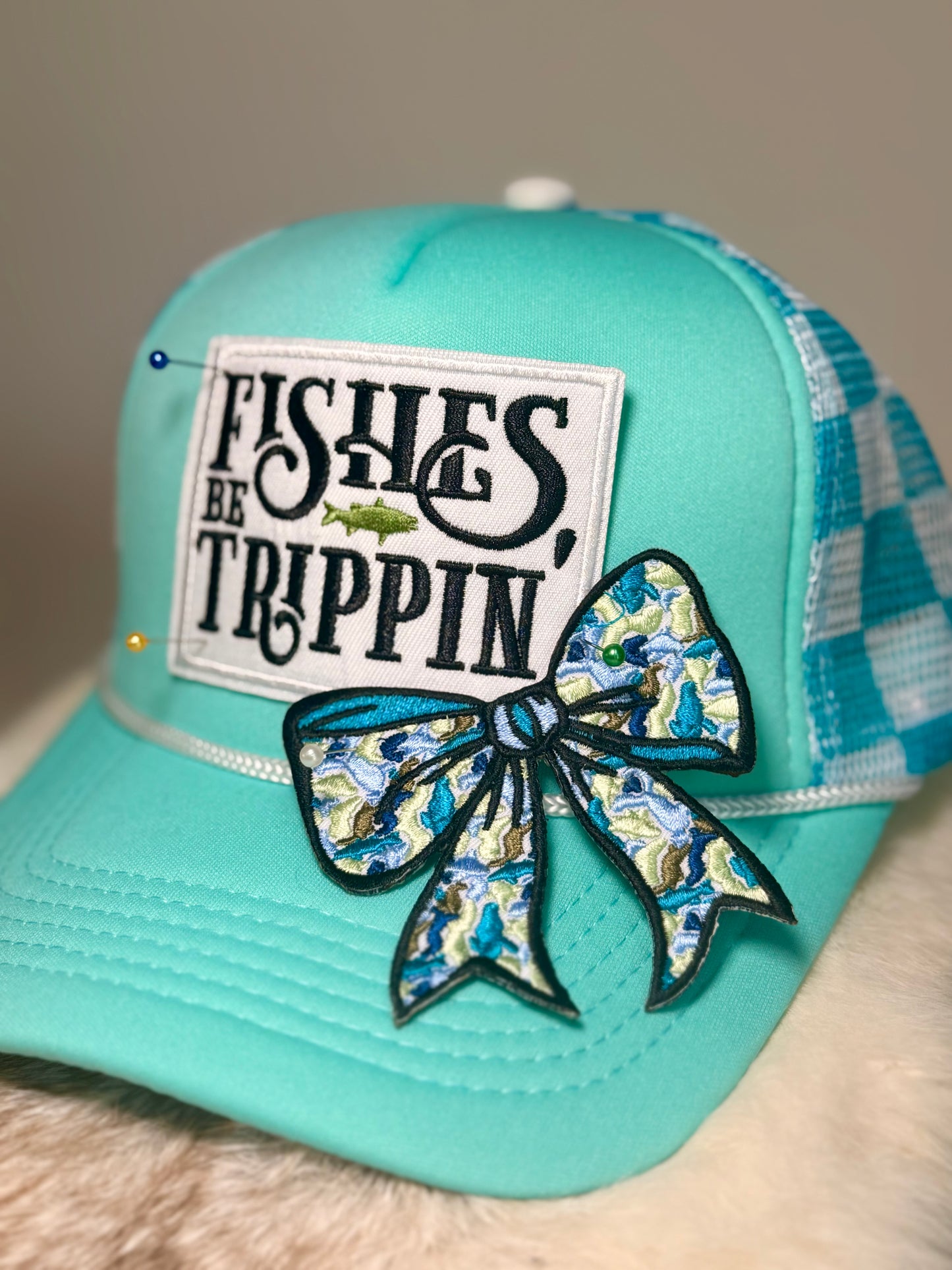 Fish Be Trippin’ Trucker Hat | Funny Fishing Hat | Aqua Fishing Boutique Hat with Camo Bow