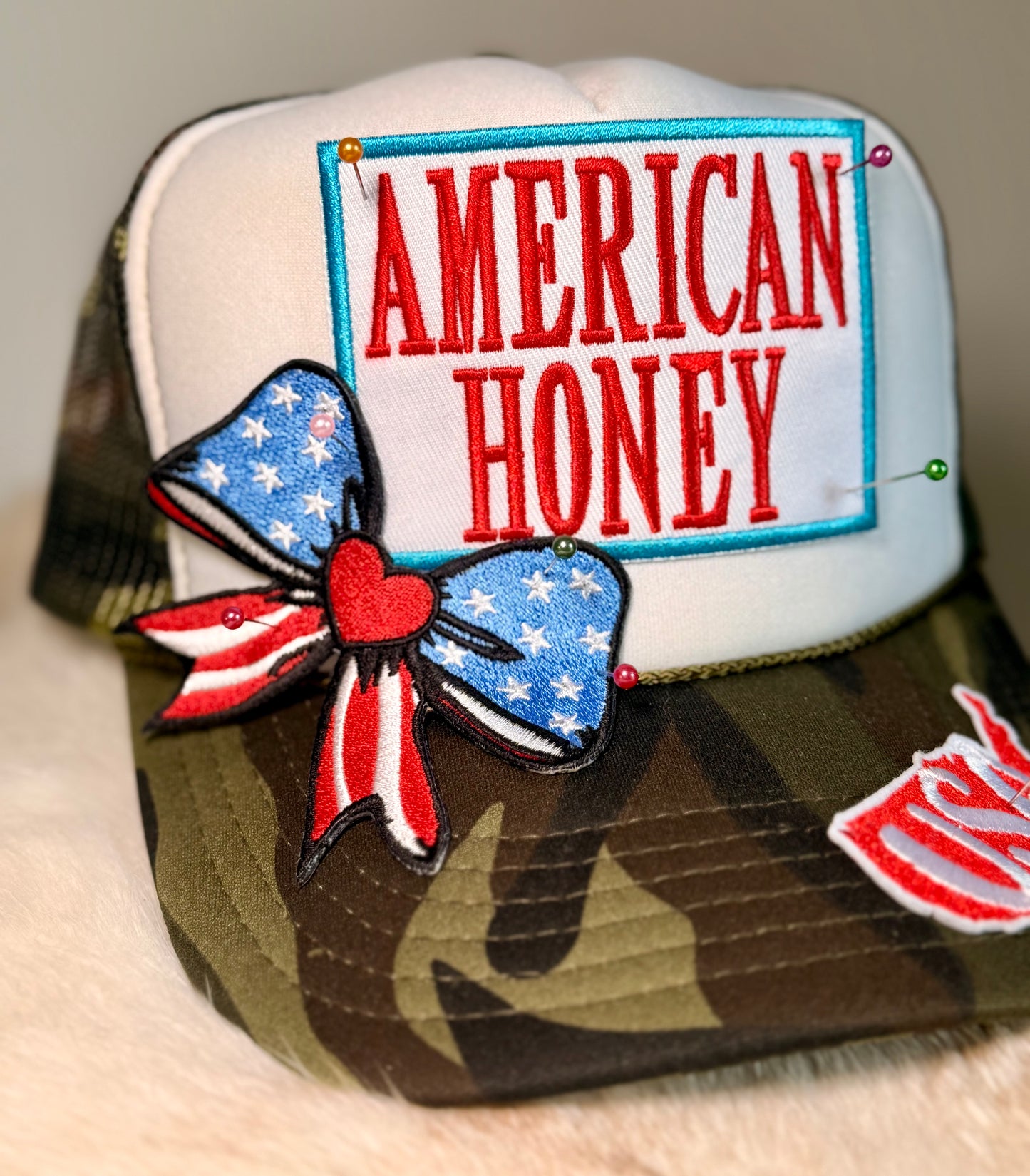 American Honey Patriotic Trucker Hat | USA Bow Hat | Camo Brim Fourth of July Boutique Hat | Red White Blue Snapback