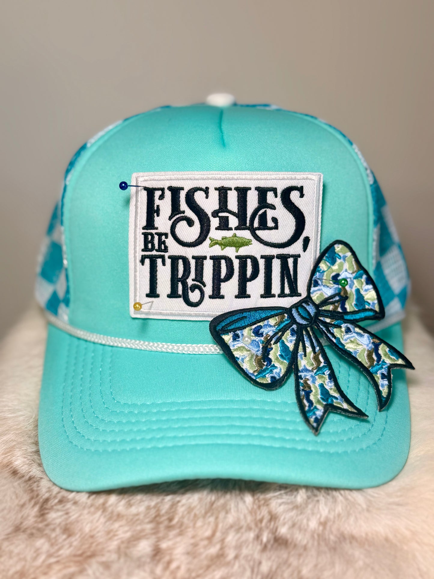 Fish Be Trippin’ Trucker Hat | Funny Fishing Hat | Aqua Fishing Boutique Hat with Camo Bow