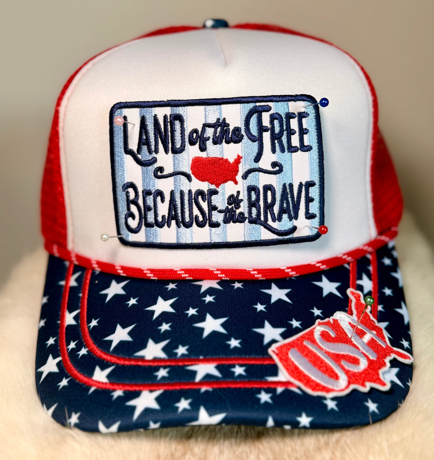 Land of the Free Patriotic Trucker Hat | USA Patch Hat with Star Brim Accent | Fourth of July Boutique Snapback