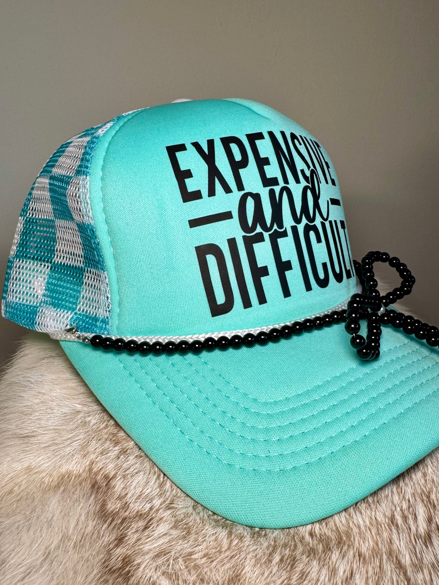 Expensive and Difficult Trucker Hat