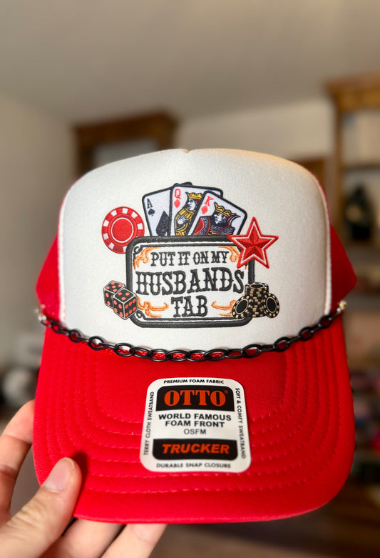 Put It On My Husband's Tab Trucker Hat